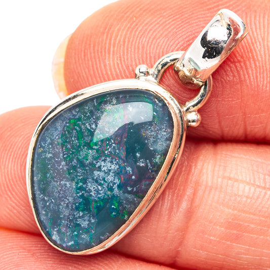 Sterling silver opal pendant with teardrop bezel, multicolor blue-green and violet stone
