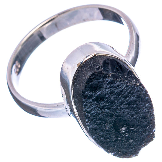 Sterling silver tektite ring with dark oval stone, size 8.75, side angle