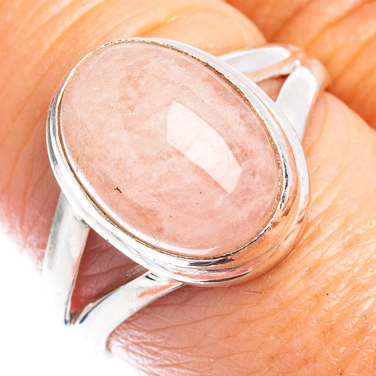 Sterling silver ring with oval rose quartz cabochon, close-up of bezel setting