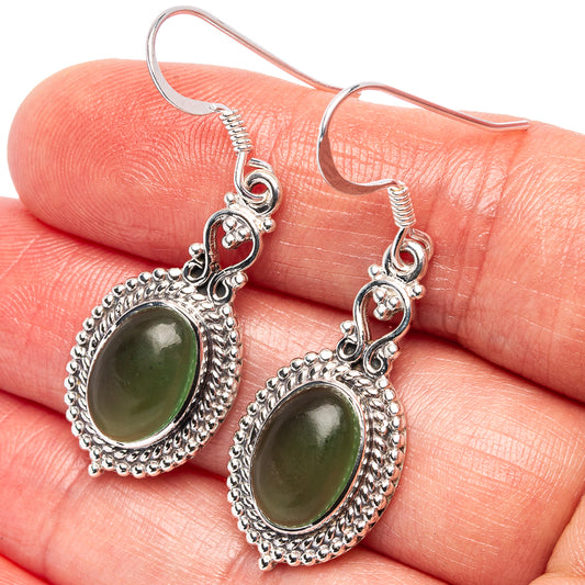Sterling silver nephrite jade dangle earrings with dark green oval cabochons