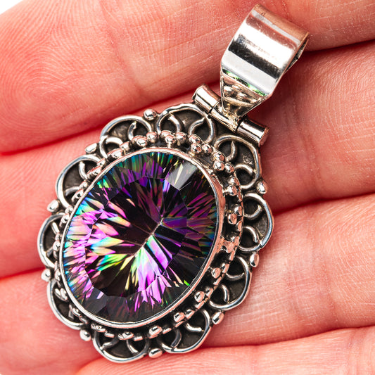 Oval rainbow mystic topaz pendant in ornate sterling silver setting, with bail.