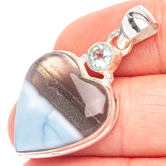Sterling silver heart pendant with blue opal center and round blue top stone