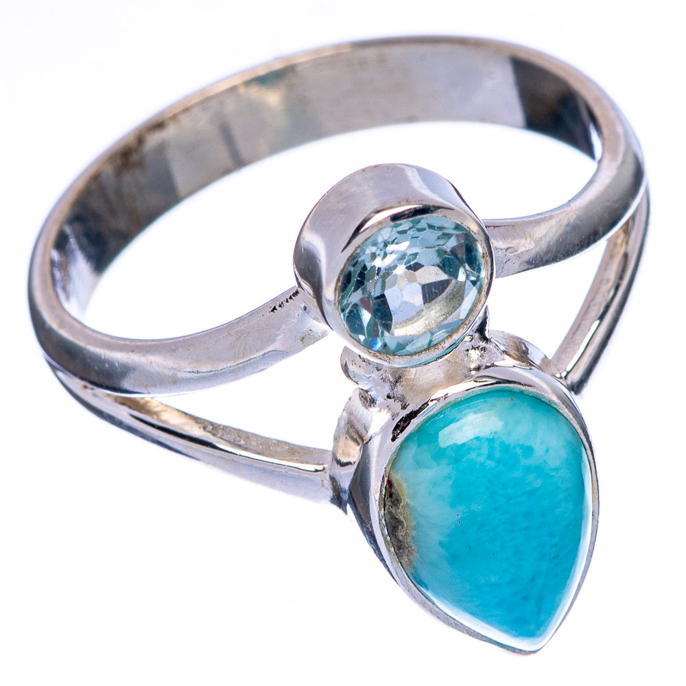 Silver ring with round blue gemstone and oval turquoise stone, open prongs