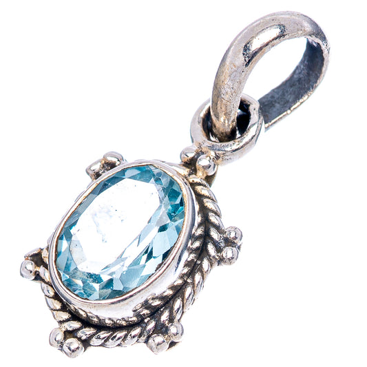 Sterling silver pendant with oval blue topaz stone and decorative rope-like frame