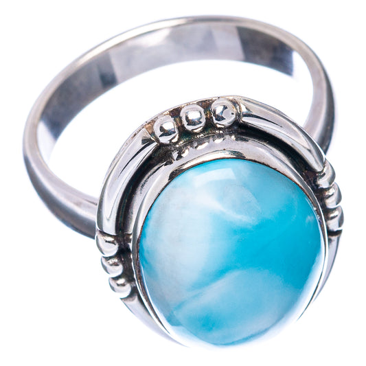 Sterling silver Larimar cabochon ring with raised bezel and bead accents