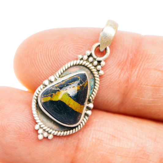 Sterling silver teardrop gemstone pendant with rope border and blue/yellow cabochon
