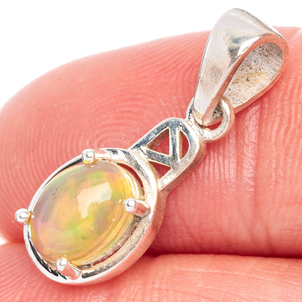 Sterling silver opal pendant with oval Ethiopian opal cabochon in bezel setting
