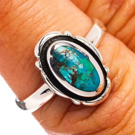 Oval turquoise stone sterling silver ring with raised bezel setting