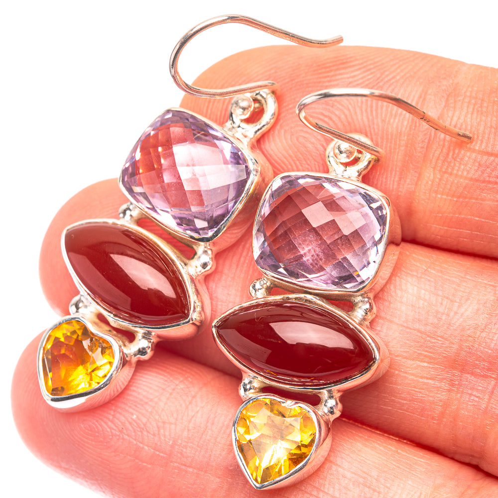 925 sterling silver drop earrings with purple, red, and yellow faceted gemstones