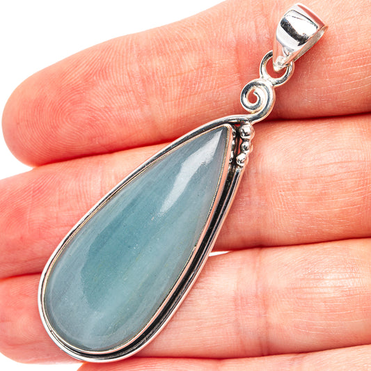 Aquamarine teardrop pendant in .925 sterling silver with oval bail, bezel-set light blue stone