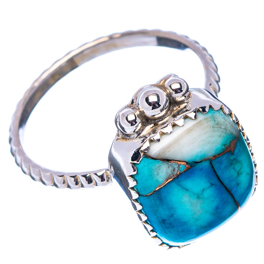 Turquoise oval cabochon ring with .925 sterling silver band and three dark set studs