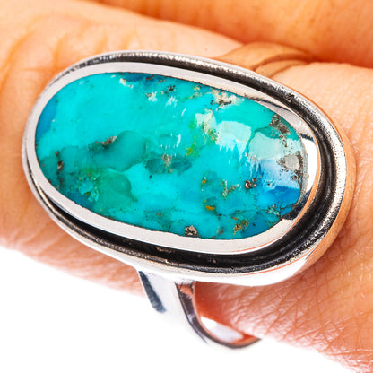 Sterling silver oval turquoise ring with turquoise stone set in beaded border