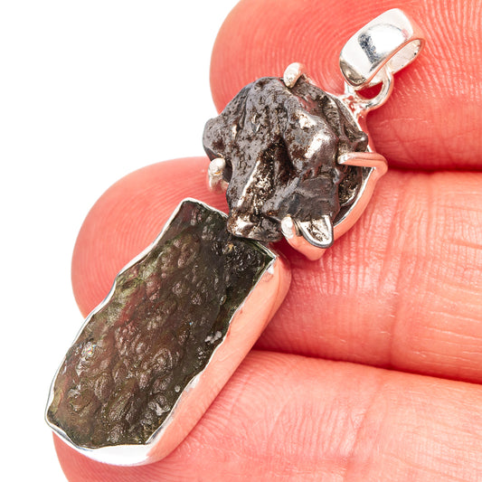 Sterling silver pendant with rough dark meteorite stone and prong setting