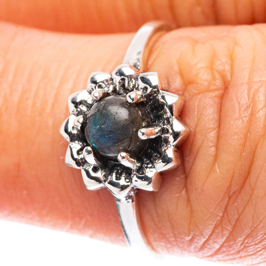 Sterling silver ring with dark blue labradorite cabochon and ornate prong setting