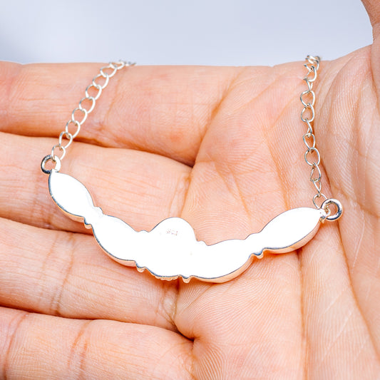 Sterling silver horse-shaped pendant necklace with white enamel and linked chain