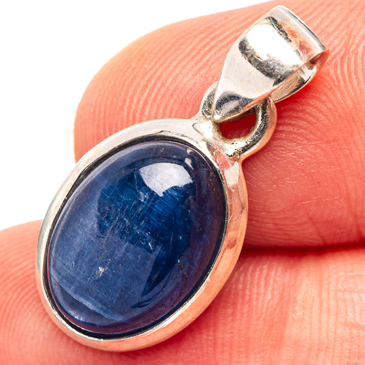 Oval blue kyanite cabochon sterling silver pendant with hinged bail, polished bezel