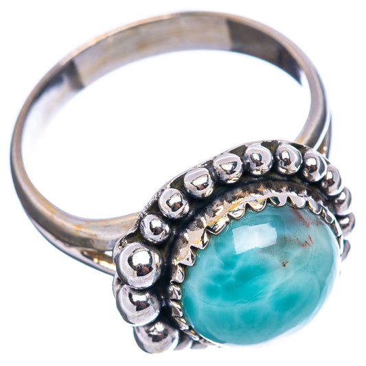 Sterling silver Larimar ring, side view of oval turquoise stone in beadwork setting