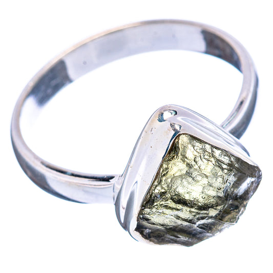 Sterling silver moldavite ring with irregular green rough stone in raised bezel