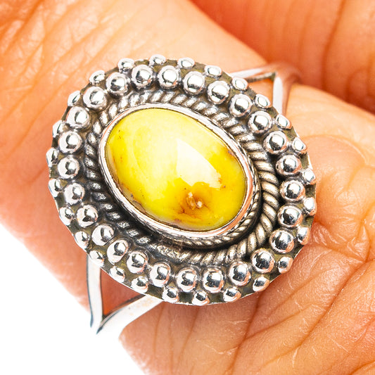 Sterling silver ring with yellow oval turquoise cabochon and beaded bezel, size 6