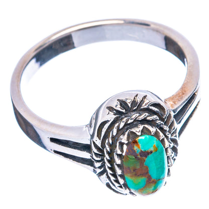 Sterling silver turquoise ring with oval stone and engraved sunburst side design