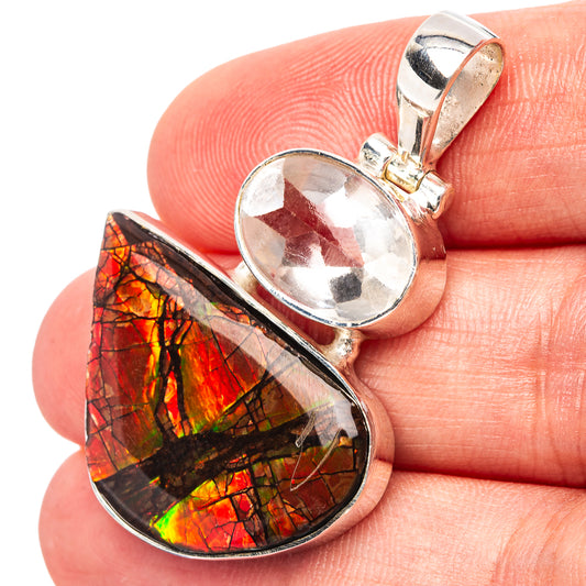 Sterling silver ammolite teardrop pendant with round white quartz cabochon