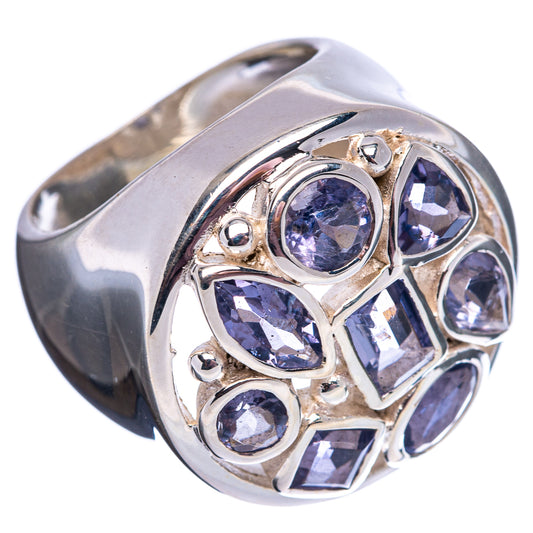 Sterling silver tanzanite ring featuring faceted oval and square purple stones