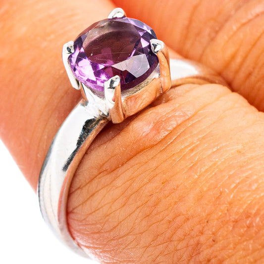 Faceted amethyst ring with .925 sterling silver band, purple stone in prong setting