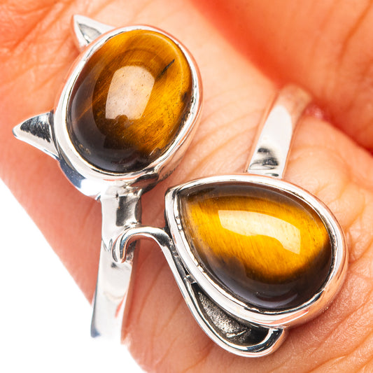 Sterling silver cat ring with two oval tiger-eye cabochons, gold-brown stripes