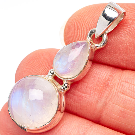 Sterling silver moonstone pendant with two oval rainbow cabochons, round bail