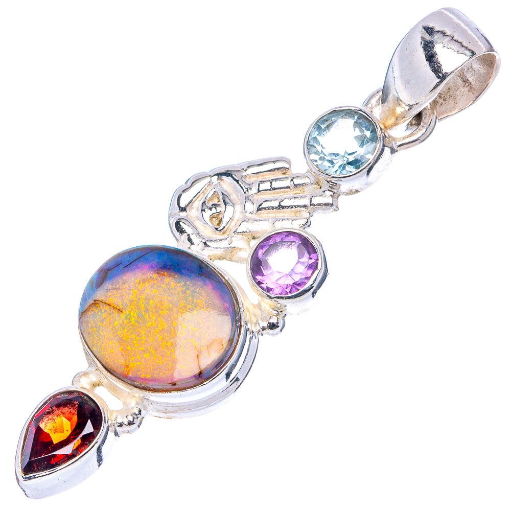 Silver pendant with large oval opal-style stone, blue topaz, purple amethyst, red gemstone, bail