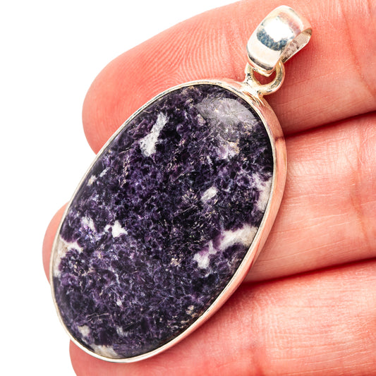 Lepidolite pendant in oval sterling silver bezel with purple gemstone cabochon and bail