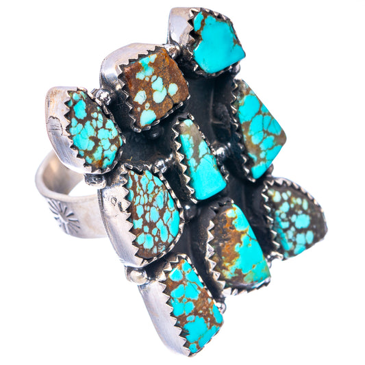 Turquoise and black stone inlay adjustable sterling silver ring, angled view on hand