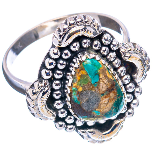 Sterling silver turquoise ring with oval stone, ornate beaded setting