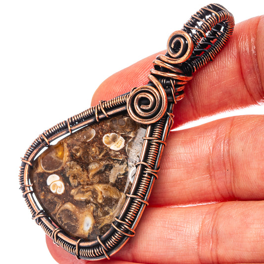 Oxidized copper wire-wrap pendant with teardrop agate stone and spiral bezel details
