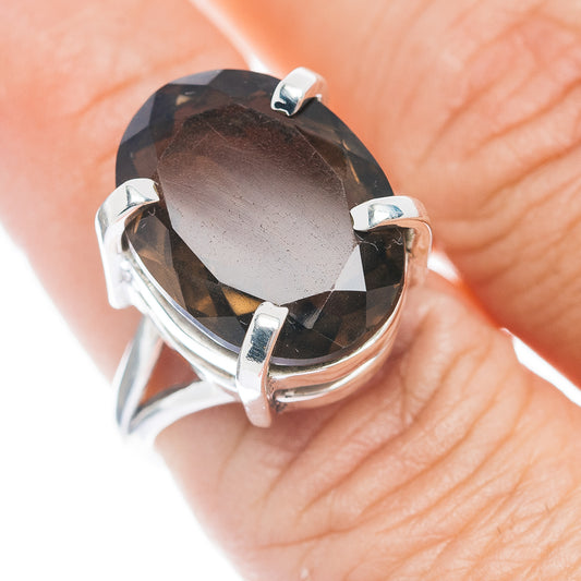 Oval faceted smoky quartz ring in .925 sterling silver with four-prong setting