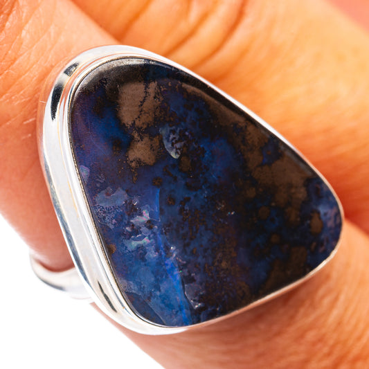 Teardrop boulder opal in .925 sterling silver bezel, deep blue with gold-brown specks