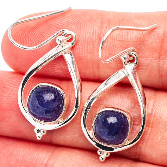 Sterling silver teardrop earrings with blue tanzanite cabochon and hook back