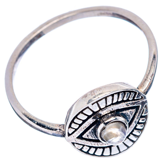 Sterling silver eye ring side view with round moonstone centerpiece