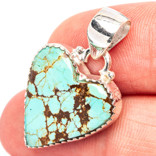 Turquoise heart pendant in .925 sterling silver with heart-shaped cabochon