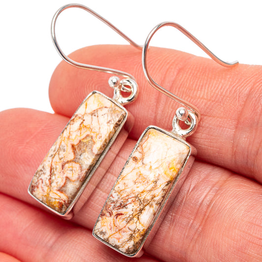 Sterling silver jasper rectangle earrings with orange-gold marbled texture, close-up