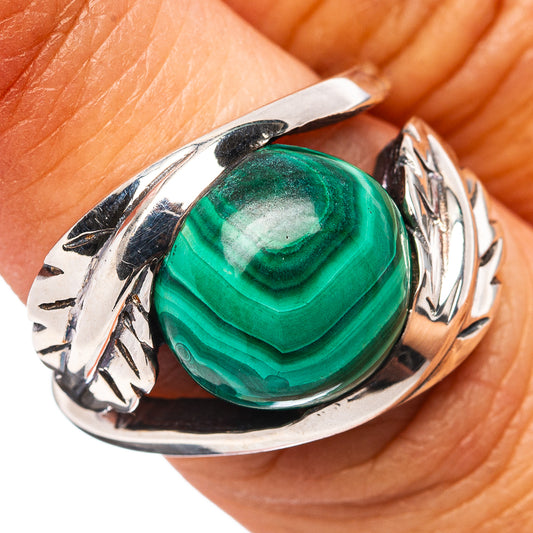 Malachite cabochon sterling silver ring with leaf-carved band and oval green stone