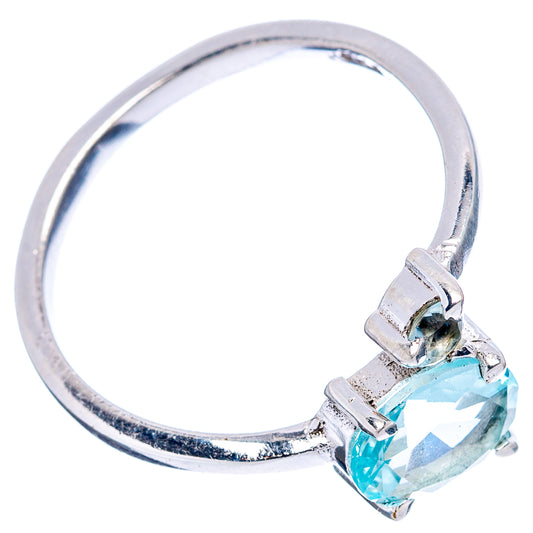 Blue topaz oval ring in .925 sterling silver with angled prongs