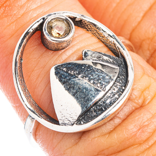 Dainty .925 sterling silver ring with citrine bezel and textured mountain motif, size 6.25