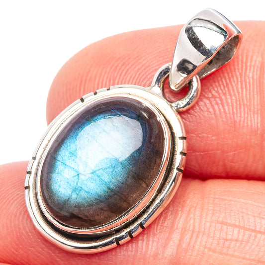 Labradorite oval pendant in .925 sterling silver bezel with blue iridescent stone