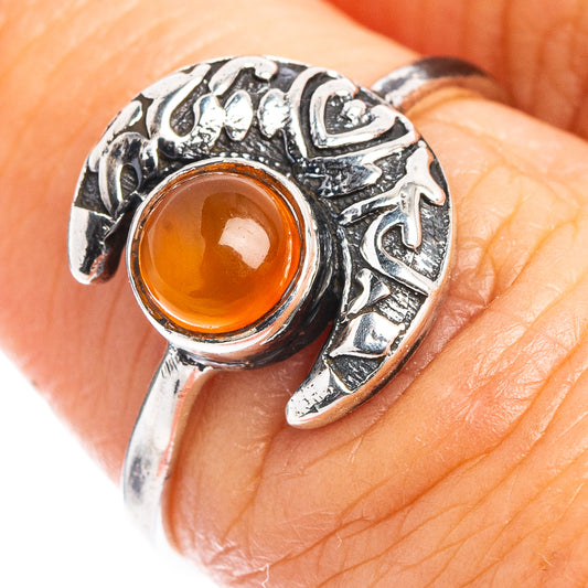 Sterling silver carnelian dainty ring with orange cabochon moon setting