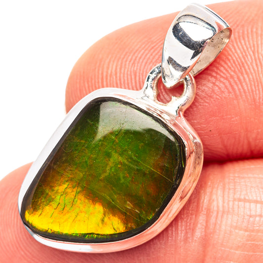 Sterling silver ammolite pendant with teardrop bezel, iridescent green and amber face
