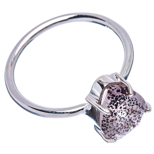 Sterling silver ring with prong-set oval purple-and-black speckled gemstone