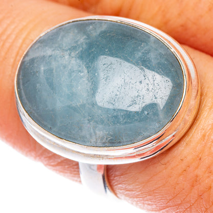 Aquamarine oval cabochon ring in polished 925 sterling silver, close-up top view