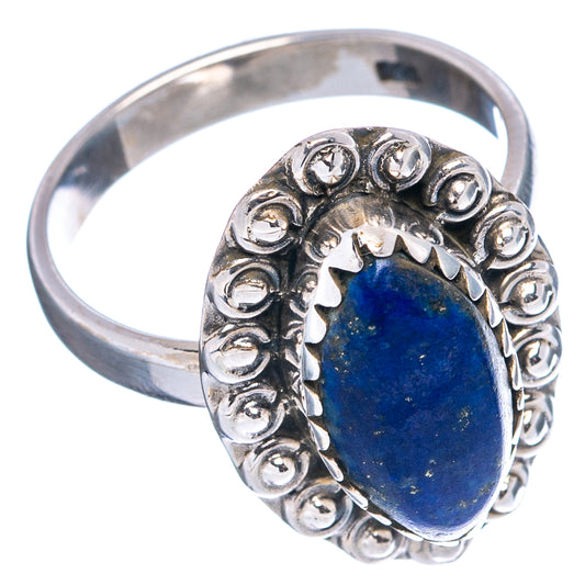 Sterling silver lapis lazuli oval ring, dark blue stone in scalloped setting on band