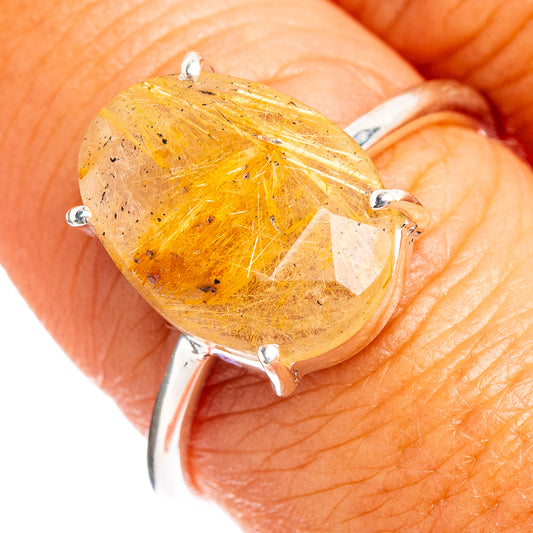 Sterling silver ring with large oval rutilated quartz, gold needle inclusions